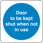 Door sign sticker: blue circle with white text 'Door to be kept shut when not in use'.