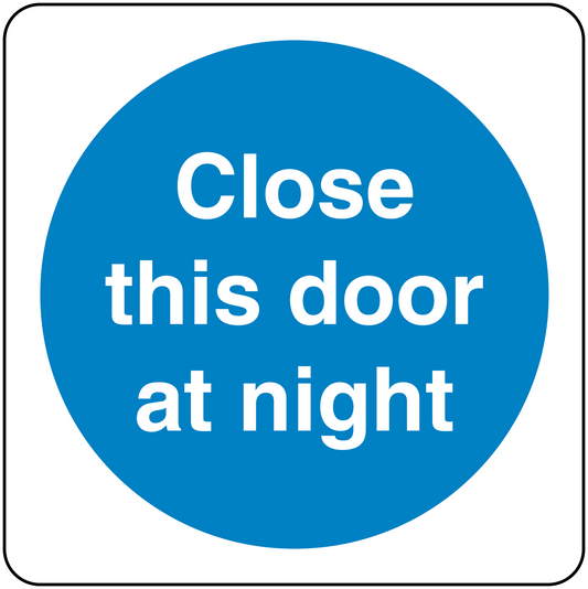 Safety sign sticker: blue circle with 'Close this door at night' text.
