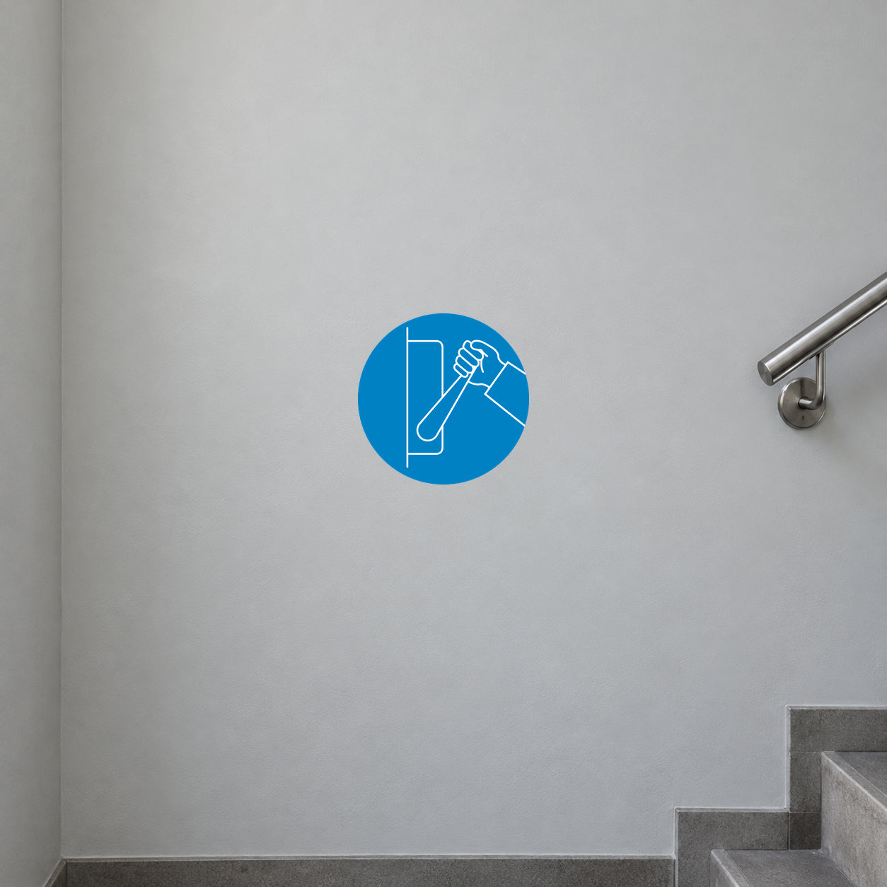 Round blue safety sign sticker with white hand icon and diagonal line.