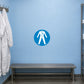 Safety sign sticker with blue circular background and white icon of person walking