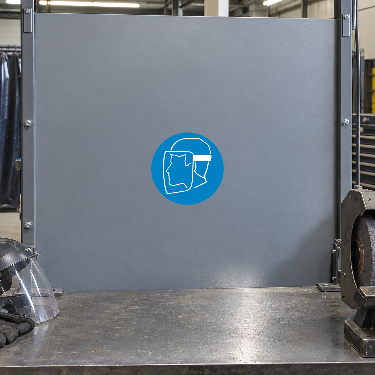 Safety sign sticker with blue circle and white outline protective gear wearer icon