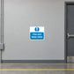 Safety sign sticker with blue door icon and text “Fire exit keep clear”
