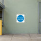 Safety sign sticker, white square with blue circle: 'Fire escape' 'Keep clear'.