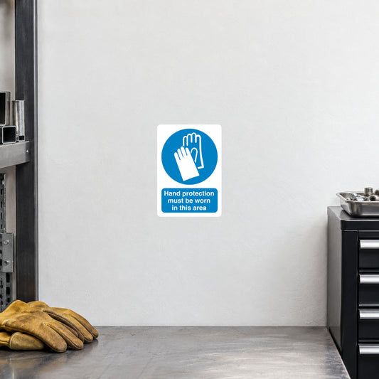 Safety sign sticker with blue hand icon and text: Hand protection must be worn in this area