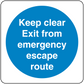 Safety sign sticker with blue circle and white text: “Keep clear Exit from emergency escape route”