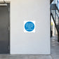 Square safety sign sticker with blue fire notice text on white background