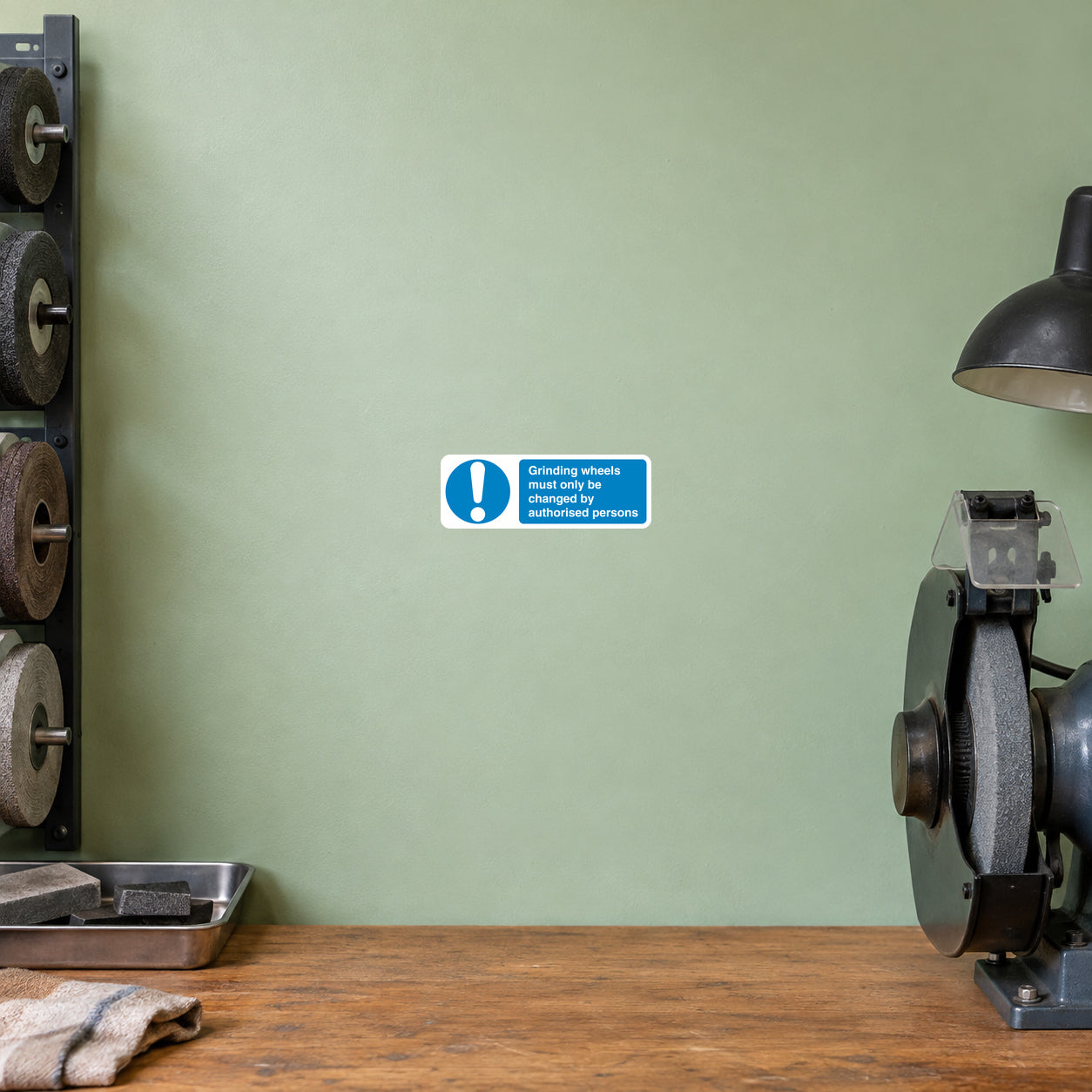 Blue and white grinding safety sign sticker with exclamation mark and warning text