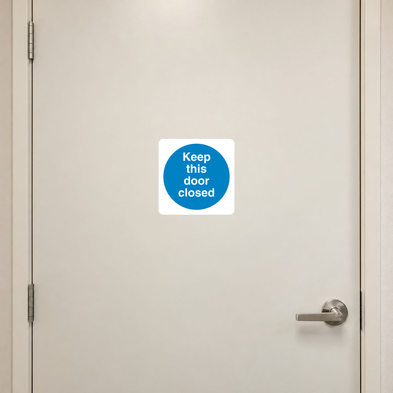 Safety sign sticker: white square with blue circle reading 'Keep this door closed'
