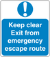 Safety sign sticker with exclamation: 'Keep clear Exit from emergency escape route'