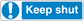 Safety sign sticker with blue border, exclamation icon, and 'Keep shut' text
