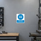 Safety sign sticker: blue goggles icon on white square with small warning text