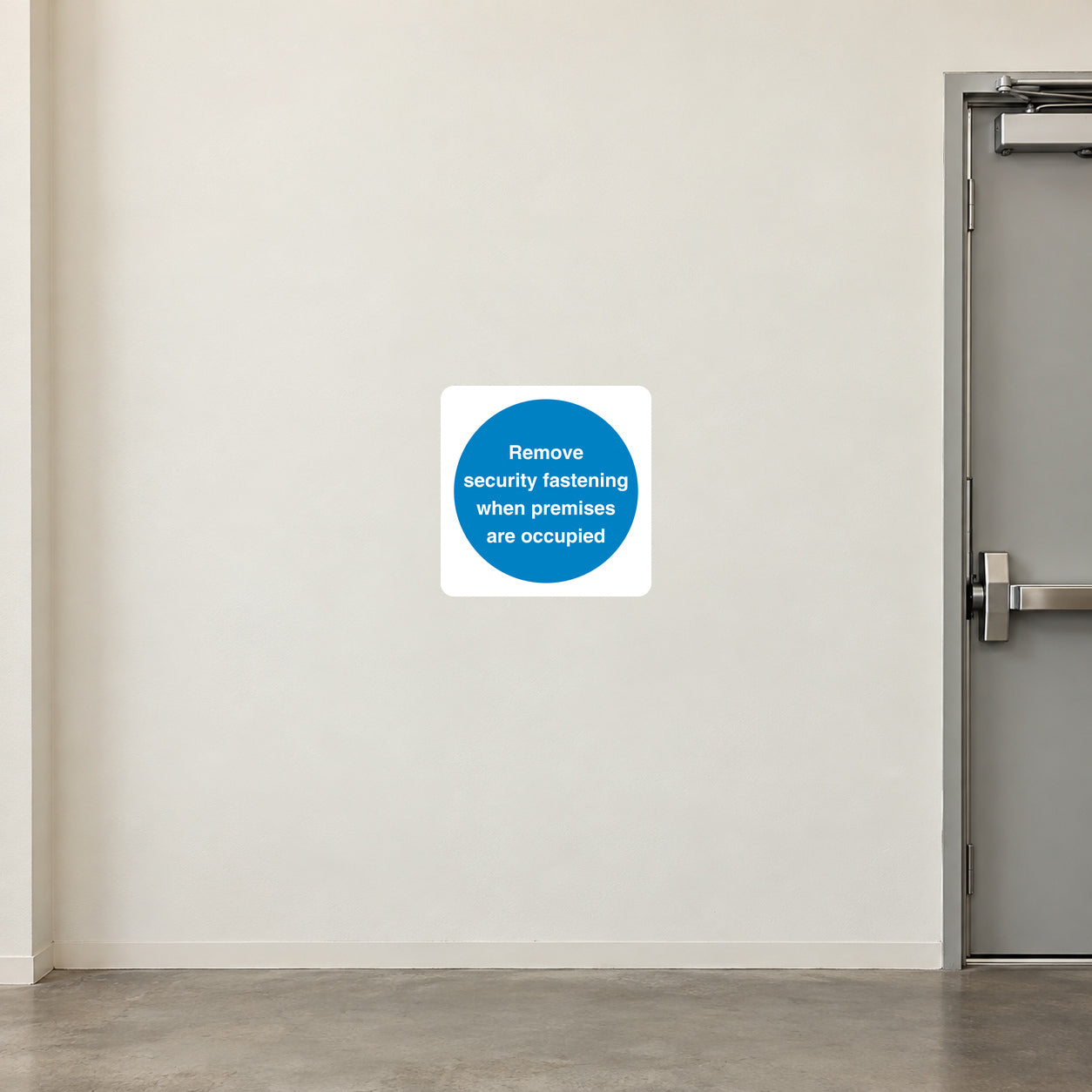 Safety sign sticker, blue circular label with white warning text.
