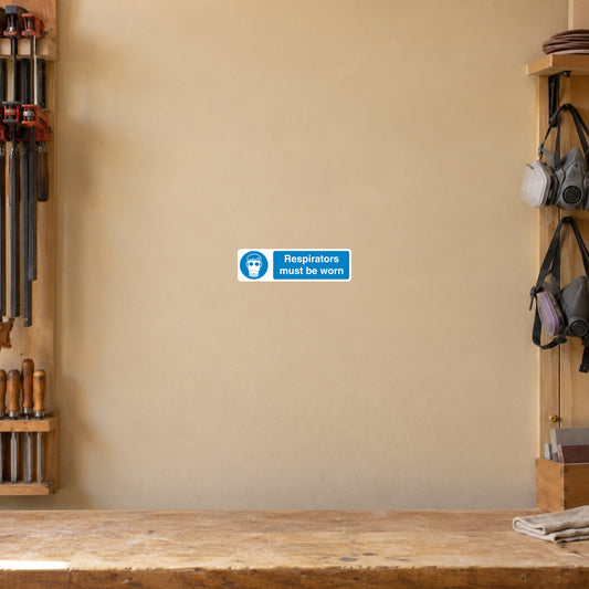 Blue safety sign sticker: Respirators must be worn