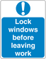 Safety sign sticker: blue with white exclamation and “Lock windows before leaving work”.