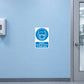 Safety sign sticker with blue mask icon: 'Masks must be worn in this area'.