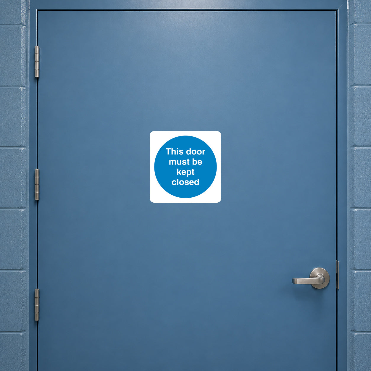Safety sign sticker: white square with blue circle reading “This door must be kept closed”