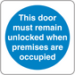 Safety sign sticker: blue circle with white text 'unlocked when premises are occupied'