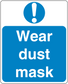 Safety sign sticker with blue background: white exclamation and text “Wear dust mask”.