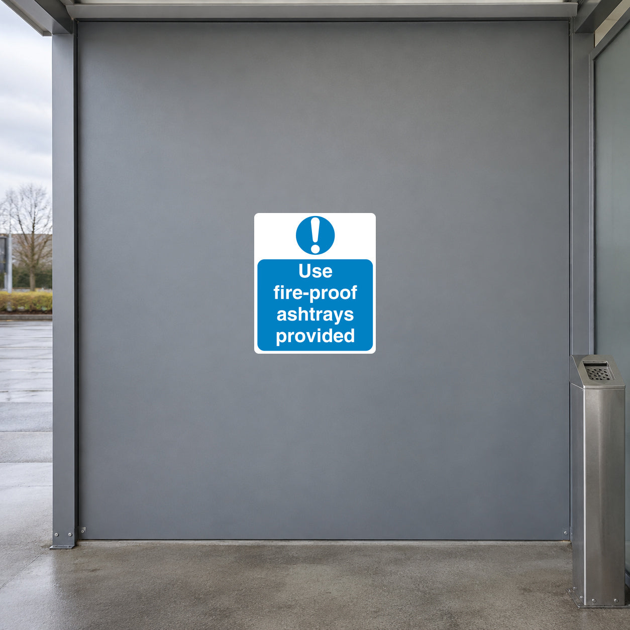 Safety sign sticker with blue 'Use fire-proof ashtrays provided' text