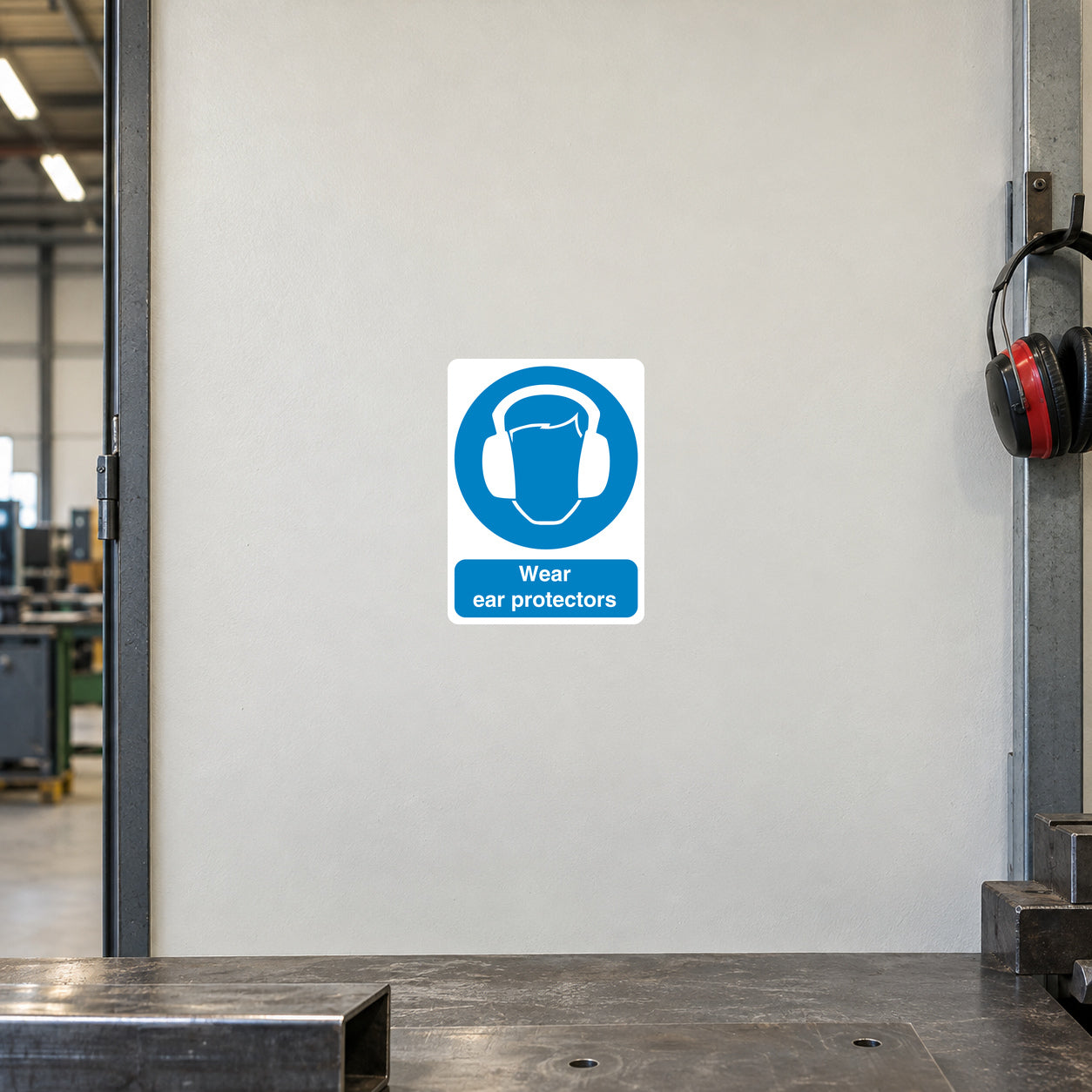 Safety sign sticker: blue ear protection icon with text "Wear ear protectors".