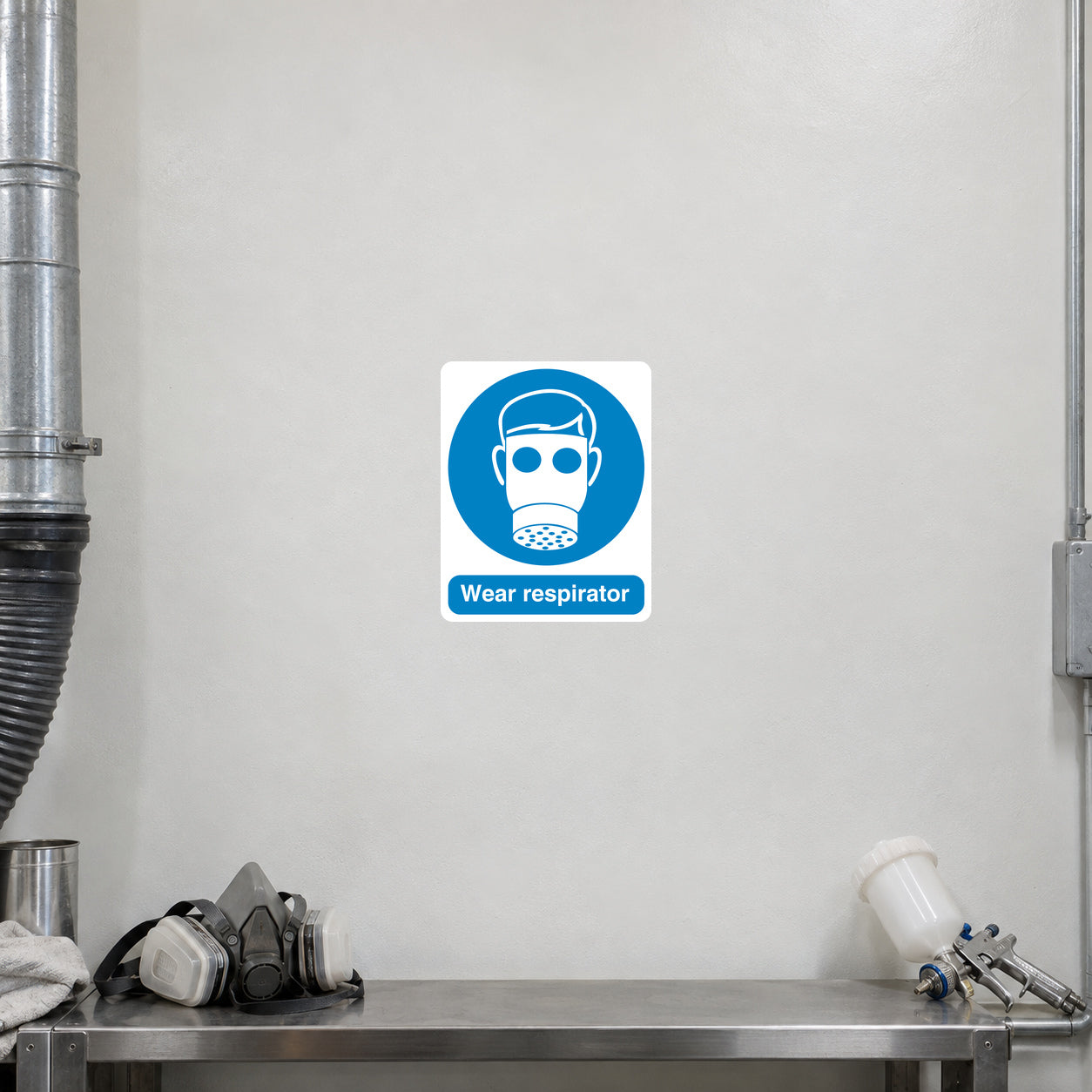 Safety sign sticker with blue respirator icon and 'Wear respirator' text