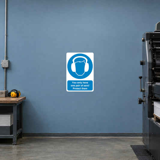 Square safety sign sticker with blue ear-protection icon and “Protect them” text