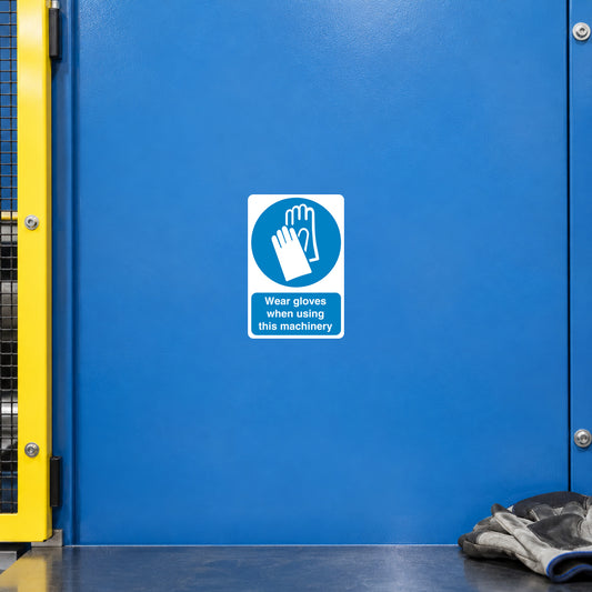 Safety sign sticker, white square: blue glove icon and text 'Wear gloves when using this machinery'