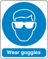 Safety sign sticker with blue goggles icon and text Wear goggles