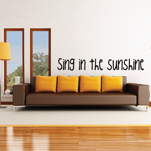 Inspirational wall decal reading “Sing in the Sunshine”