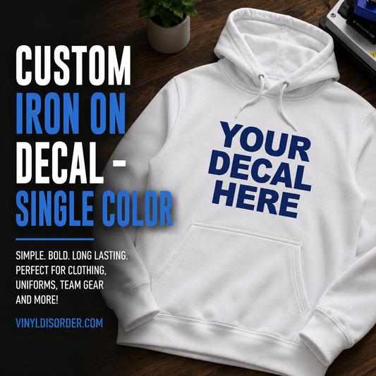 White hoodie with single-color blue iron-on decal across the chest
