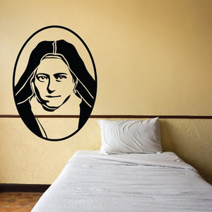 Nun face wall decal with oval outline, black silhouette and pale robe graphic