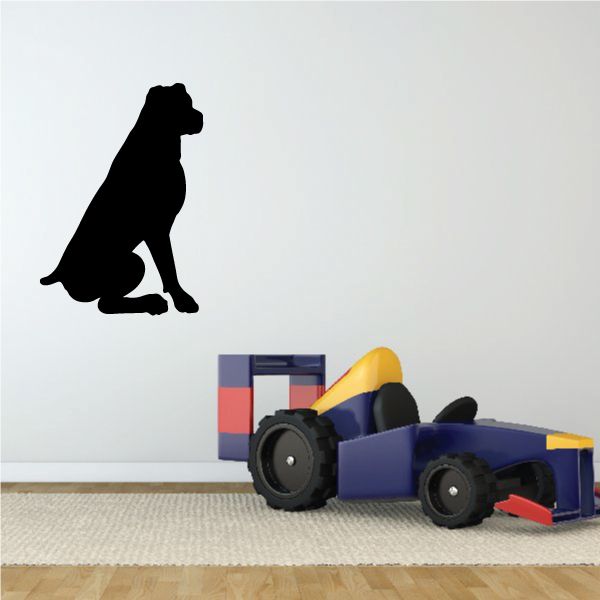 Sitting rottweiler decal of a black dog silhouette looking away