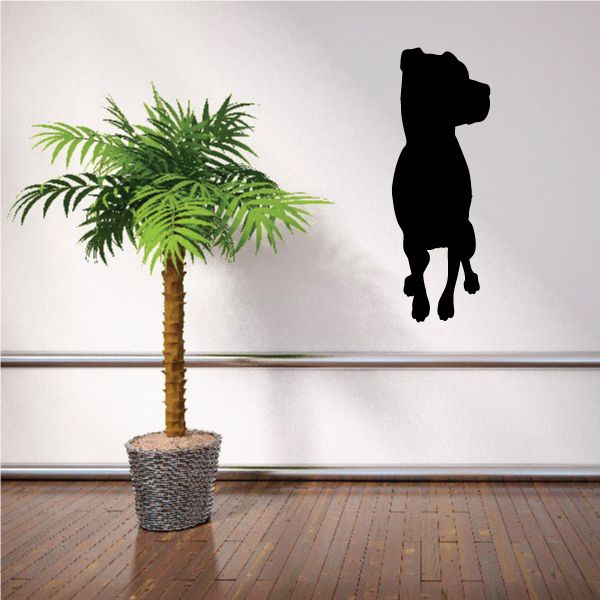Sitting rottweiler vinyl decal silhouette, facing right