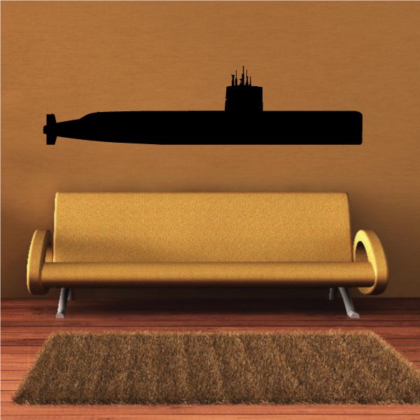 Submarine-themed decal with dark top and gold body, front fin details