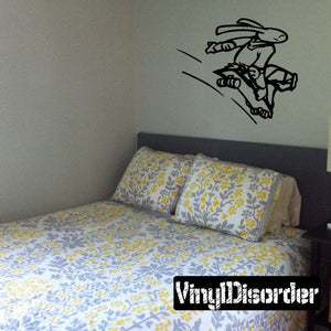 Skateboarding bunny wall decal, black vinyl outline