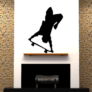 Black skateboarder wall decal silhouette in action pose, vinyl sticker