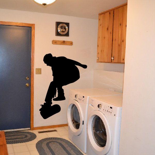 Skateboarding wall decal with black skateboarder silhouette