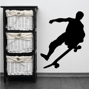 Skateboarder wall vinyl decal, black silhouette with skateboard