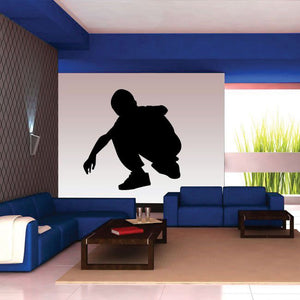 Black skateboarder silhouette wall decal on a light background square
