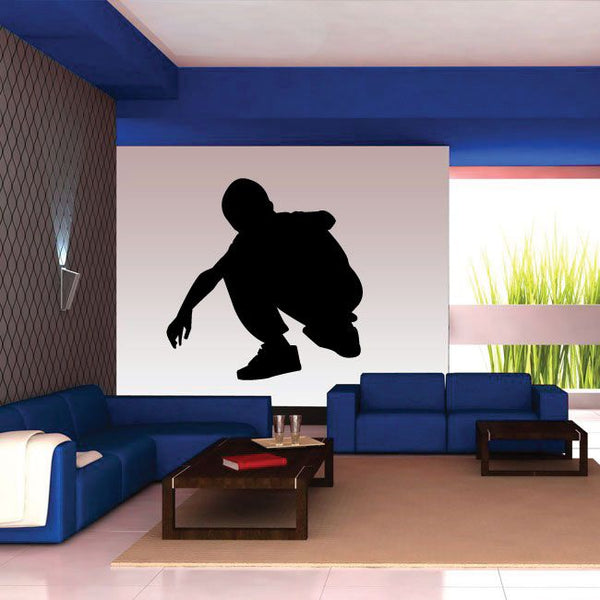 Black skateboarder silhouette wall decal on a light background square