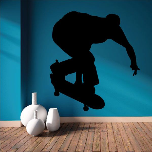 Skateboarding wall decal: black silhouette of a skater on a skateboard