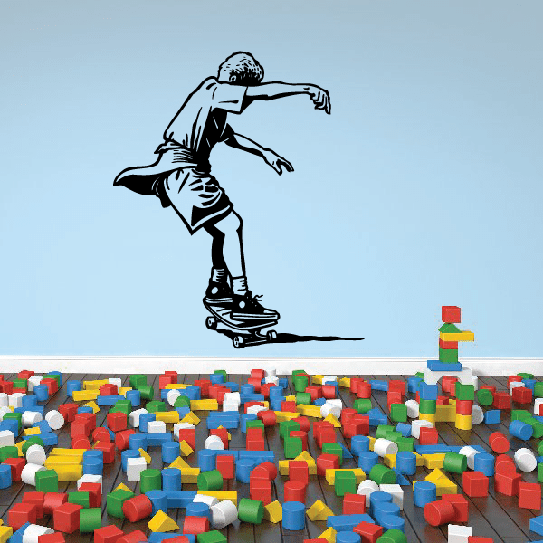 Skateboarder vinyl wall decal, black outline figure riding a skateboard
