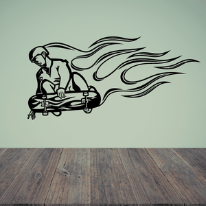 Skateboarding wall decal of black skateboarder with flaming flames motif