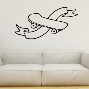 Black cartoon skateboard wall decal with flame-like accents and eyes