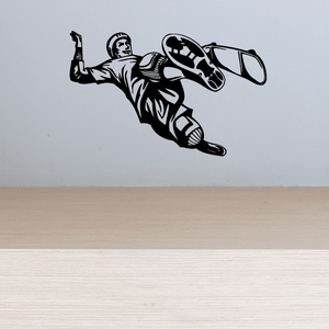 Skateboarding vinyl wall decal: black skater riding skateboard