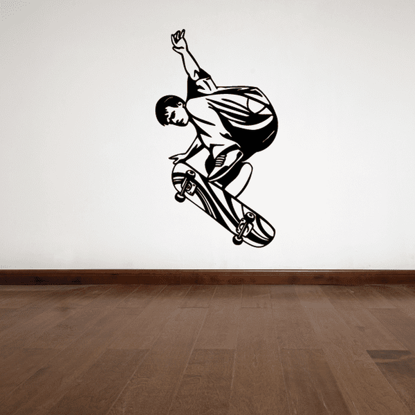 Skateboarding wall vinyl decal showing a black skateboarder with board