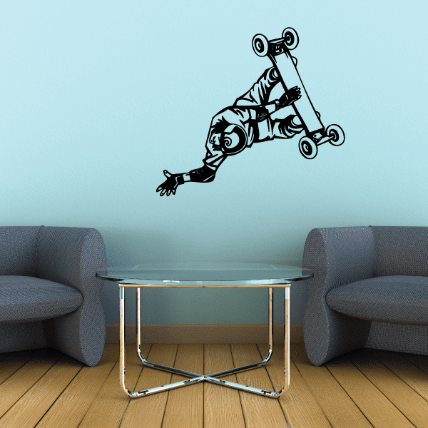 Skateboarding wall decal of a cartoon skater doing a spin on a board, black and white