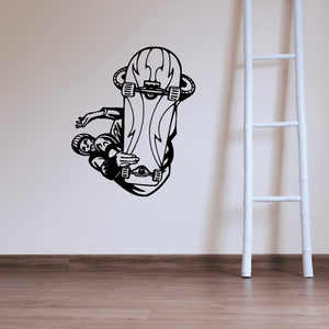 Skateboarding wall decal of a stylized skater riding a skateboard, black and white.