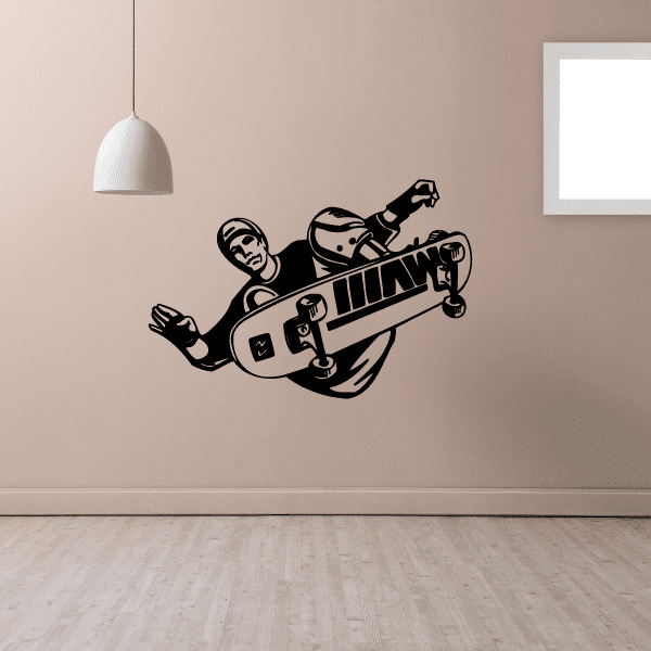 Skateboarding wall decal featuring a black skateboard with wheels and rider graphic