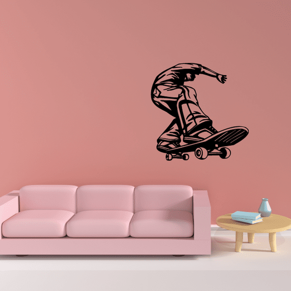 Vinyl skateboard wall decal showing black skater doing a trick with a skateboard